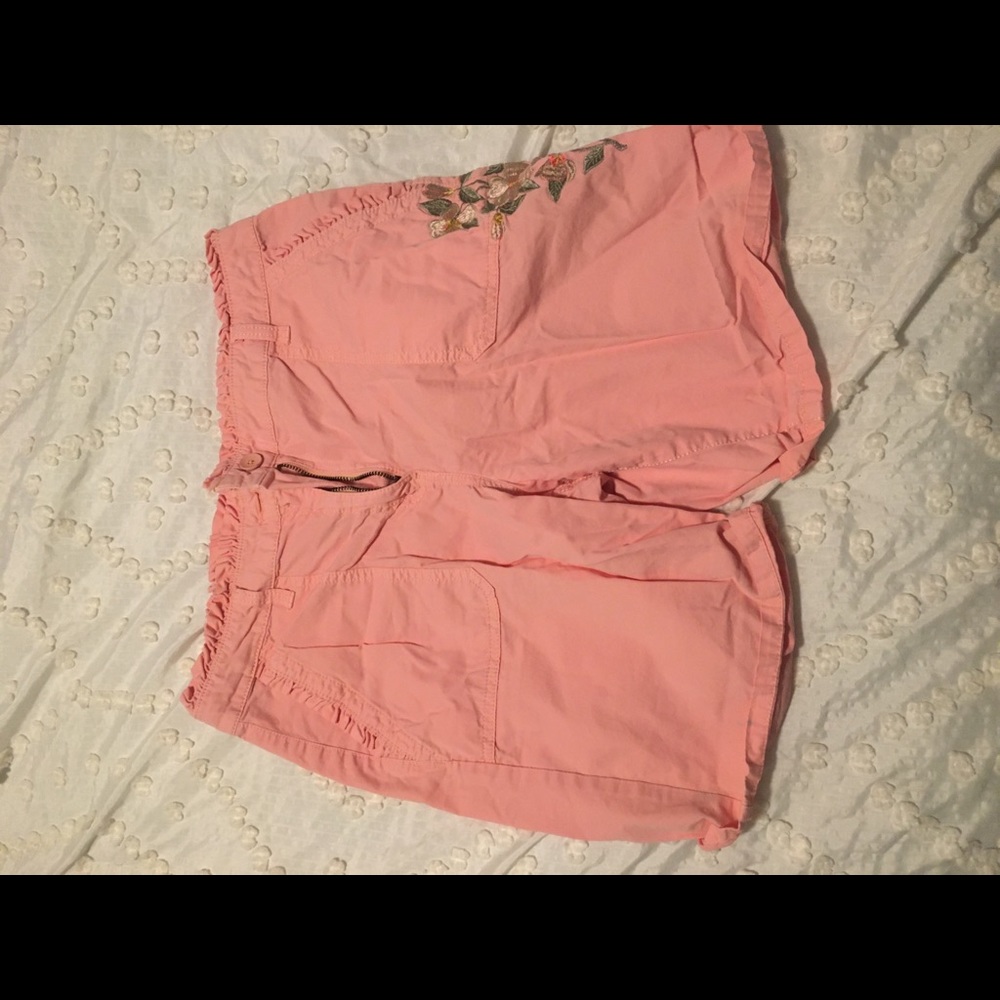 Pink flower shorts.